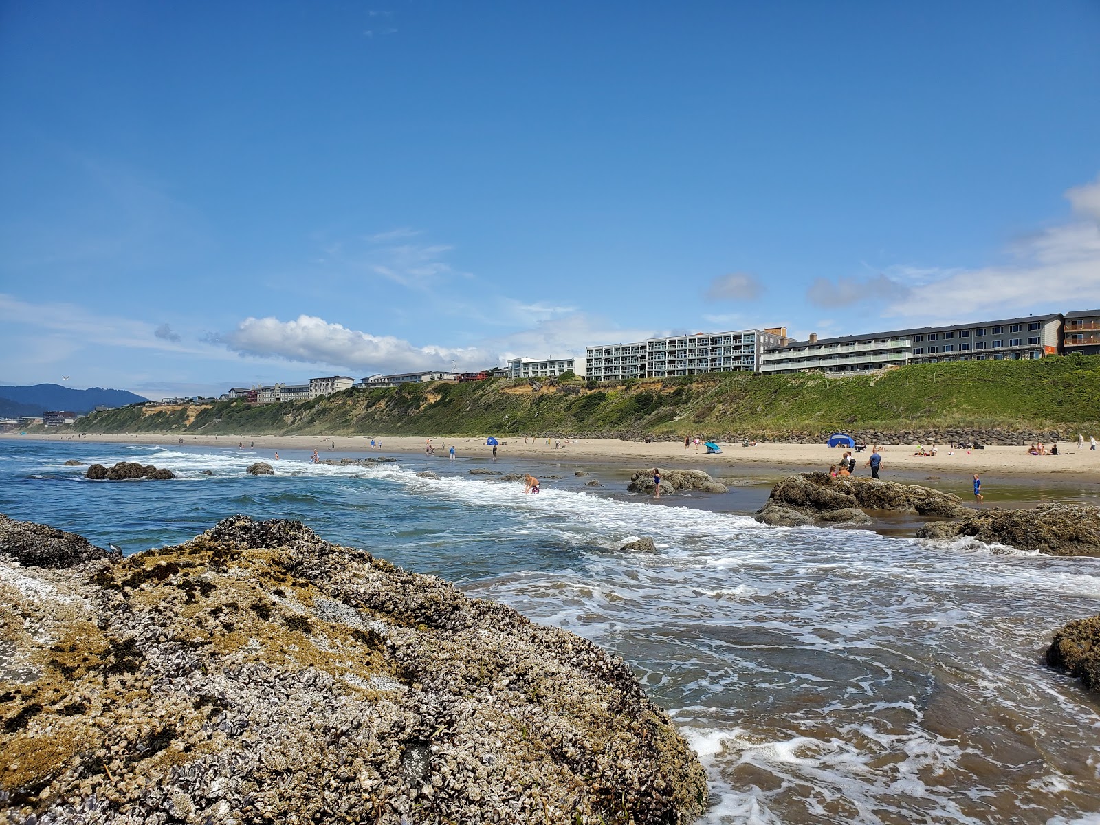 Photo of Lincoln City Beach with bright fine sand surface
