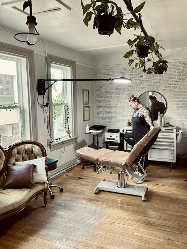 Explore small flower tattoo ideas, creative tattoo ideas in Watertown, available at Golden Pathos Ink