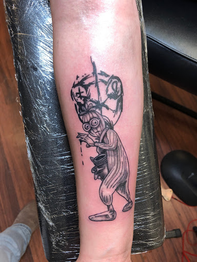 Explore free hand tattoo ideas, creative tattoo ideas in Alamosa, available at The Shop Tattoo & Comics