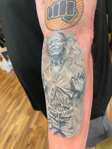 Explore elephant tattoo ideas for guys, creative tattoo ideas in Saint Paul, available at Capital Tattoo