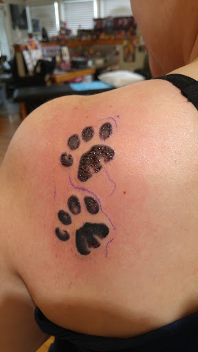 Explore female stomach tattoo ideas, creative tattoo ideas in Baldwinsville, available at Tymeless Tattoo