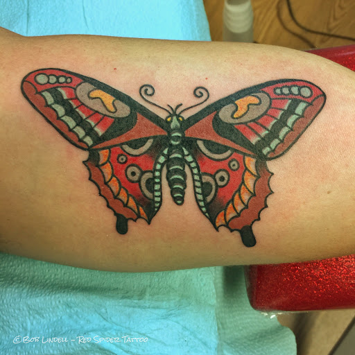 Explore cruise ship tattoo ideas, creative tattoo ideas in Putnam, available at Red Spider Tattoo