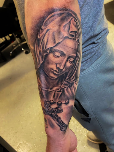 Explore tattoo ideas for bicep, creative tattoo ideas in Calhoun, available at Ink Factory Tattoos