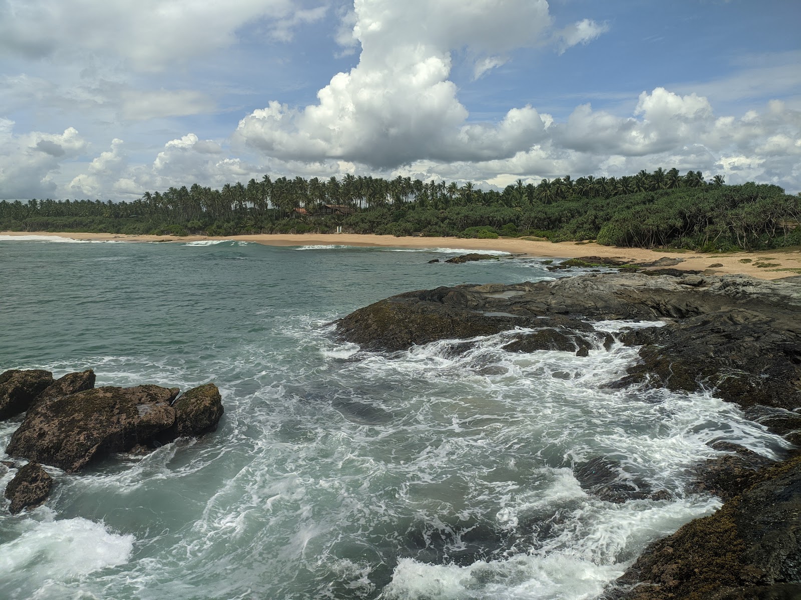 Foto von Rekawa Turtle Beach mit geräumiger strand