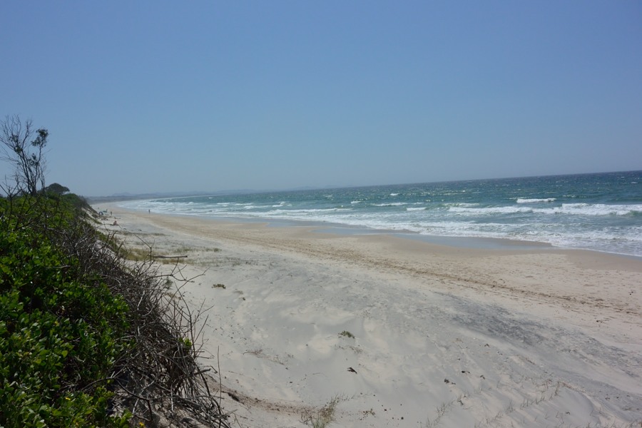 Foto van Tyagarah Beach gelegen in een natuurlijk gebied
