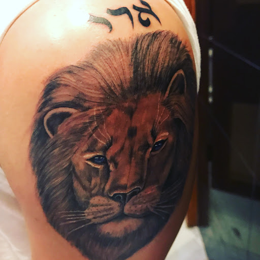 Explore family over everything tattoo ideas, creative tattoo ideas in Washington, available at Embassy Tattoo