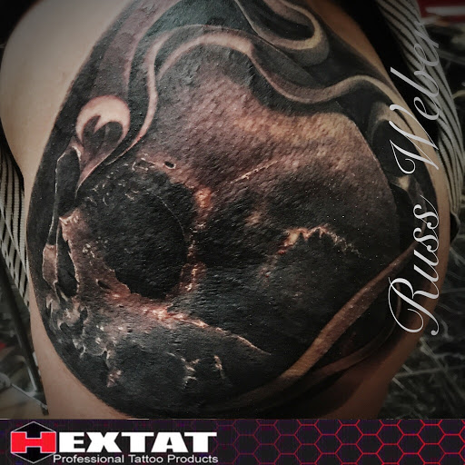 Explore letter r tattoo ideas, creative tattoo ideas in Tucson, available at Sacred Art Tattoo Studio