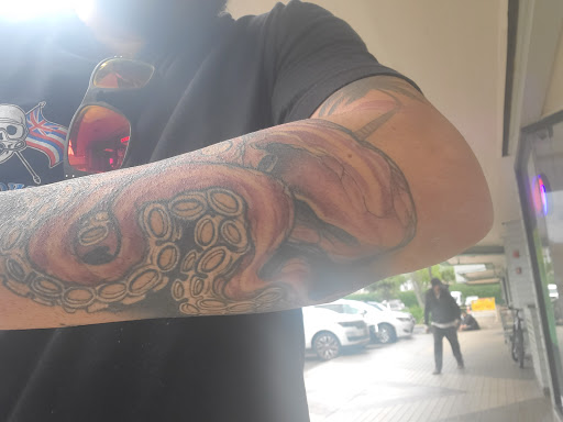 Explore grumpy tattoo ideas, creative tattoo ideas in Honolulu, available at Tattoolicious Tattoo Waikiki