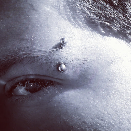 Find ideas for tattoo wedding rings for your next unique tattoo in Albuquerque at Staceys Exotic Body Piercing and Tattoo