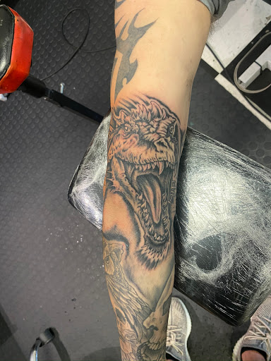 Explore gangsta tattoo sleeve ideas, creative tattoo ideas in Chillicothe, available at Grimey Inc Tattoos