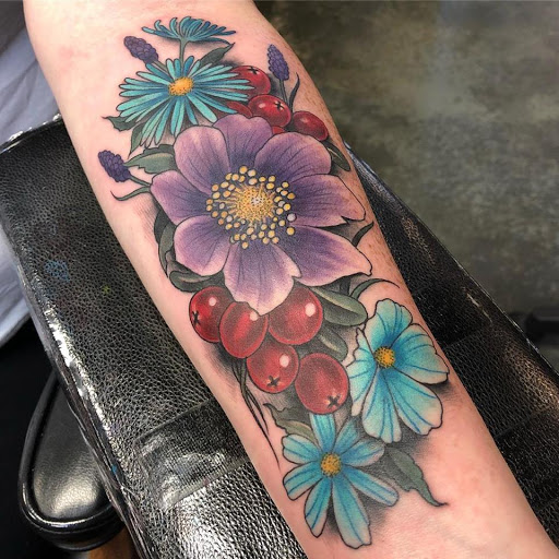 Explore aang tattoo ideas, creative tattoo ideas in Dunn, available at Heart and Hammer Tattoo Co.