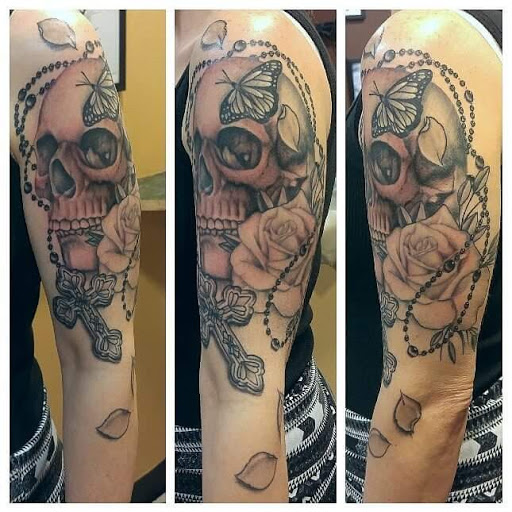 Explore violin tattoo ideas, creative tattoo ideas in Amherst, available at Wanderlust Tattoo & Piercing