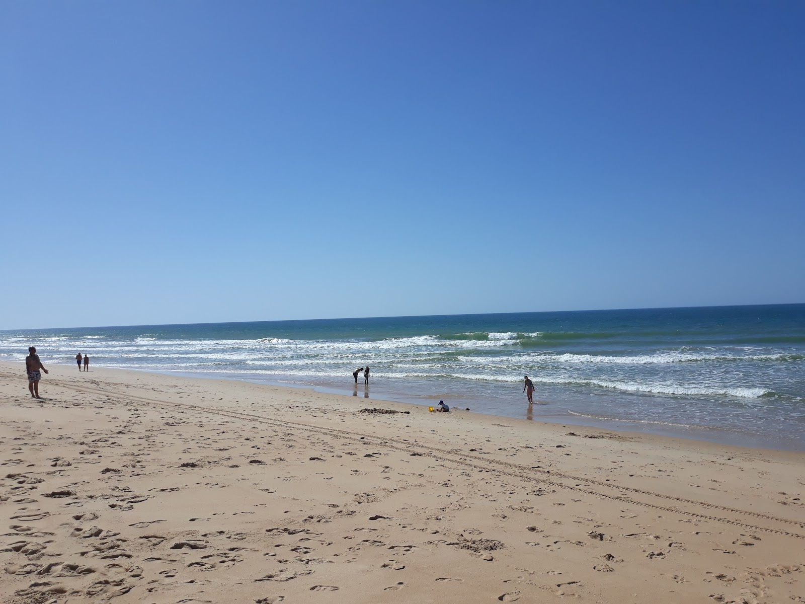 Fotografija Praia do Ancao z dolga ravna obala