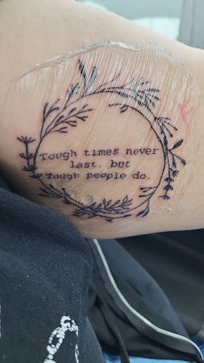 Find tattoo ideas for upper arm men for your next unique tattoo in Toledo at Artistik Tat2 and Body Piercing