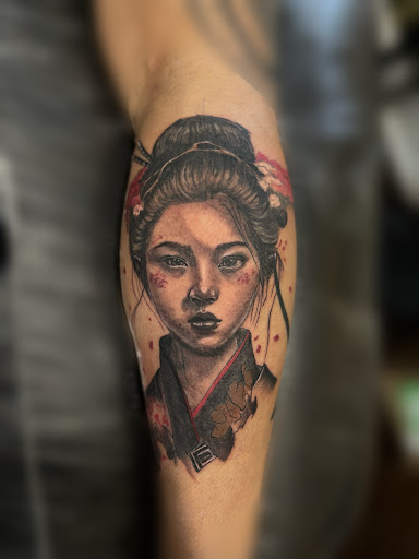 Explore behind the ear tattoo ideas for guys, creative tattoo ideas in Federal Way, available at Crimson Heart Studio
