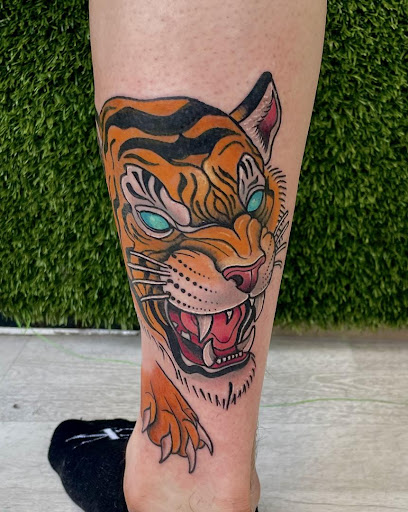 Explore narrow tattoo ideas, creative tattoo ideas in Cocoa, available at Rorschach Tattoo Shop and Piercing Studio