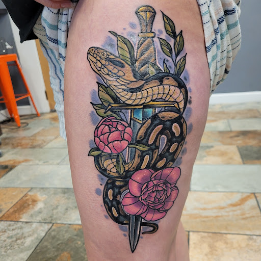 Explore hawk tattoo ideas for females, creative tattoo ideas in Omaha, available at Ironwood Ink