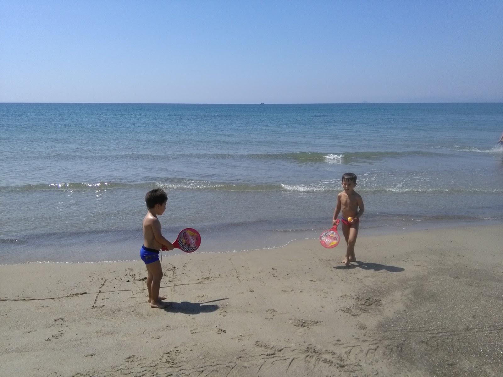 Fotografie cu Carbonifera dog beach zonă de stațiune de pe plajă