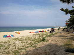Songjeong Beach'in fotoğrafı ve yerleşim