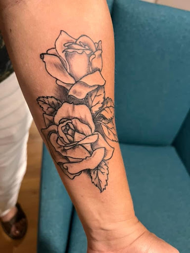 Explore magnolia tattoo ideas, creative tattoo ideas in Lake City, available at Crooked Spines Tattoo Studio