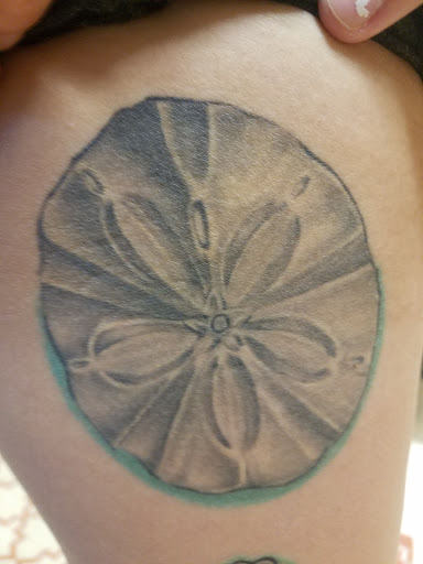 Tattoo Shop «magnum opus tattoo company», reviews and photos, 1817 Padre Blvd #4, South Padre Island, TX 78597, USA