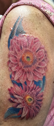 Explore strong woman tattoo ideas, creative tattoo ideas in Titusville, available at Davinci Tattoo