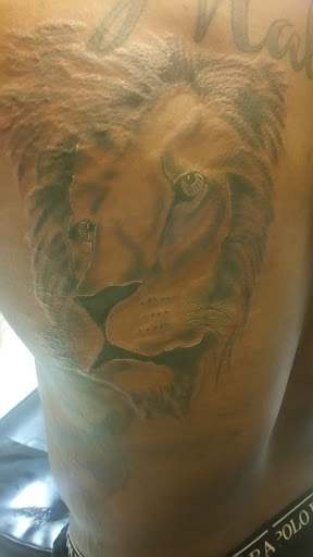 Explore men's dark tattoo ideas, creative tattoo ideas in Brunswick, available at Street Life Tattoos