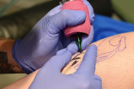 Explore blue flame tattoo ideas, creative tattoo ideas in Greenfield, available at Garden of Eden Tattoos