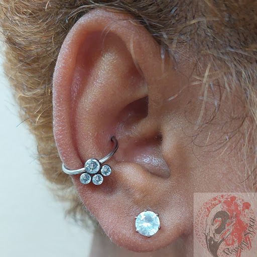 Explore tulip tattoo ideas, creative tattoo ideas in Las Vegas, available at Primal Soul Piercing Studio