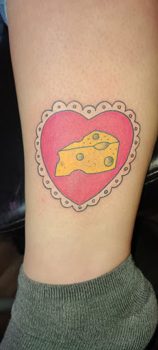 Explore tattoo word cover up ideas, creative tattoo ideas in Meadville, available at Lucky Lucys Tattoo and Art Studio