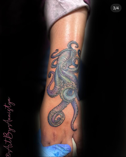 Explore tattoo ideas womens thigh, creative tattoo ideas in Biloxi, available at Artisan Ink Studio