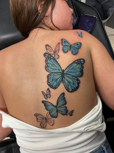 Explore flower tattoo ideas arm, creative tattoo ideas in Eden, available at Slicks Tattoo Studio