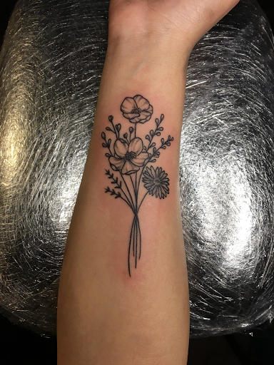 Explore muscle tattoo ideas, creative tattoo ideas in Warner Robins, available at Untold Pain Tattoo Studio