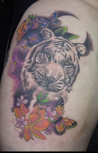 Explore fish tattoo ideas, creative tattoo ideas in Angola, available at Hoodlum Ink