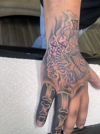 Explore tattoo ideas for wrist for guys, creative tattoo ideas in Watford City, available at Soulful Ink Studios