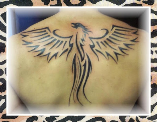 Explore year 2000 tattoo ideas, creative tattoo ideas in Lima, available at White Wizard Tattoo & Body Piercing