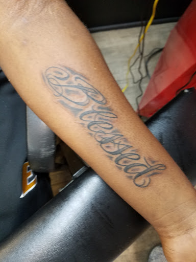 Explore finger tattoo ideas for guys, creative tattoo ideas in Frankfort, available at AMaysing Ink Tattoos and Piercings