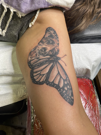 Explore butterfly leg tattoo ideas, creative tattoo ideas in San Diego, available at Inkfinite Artistry