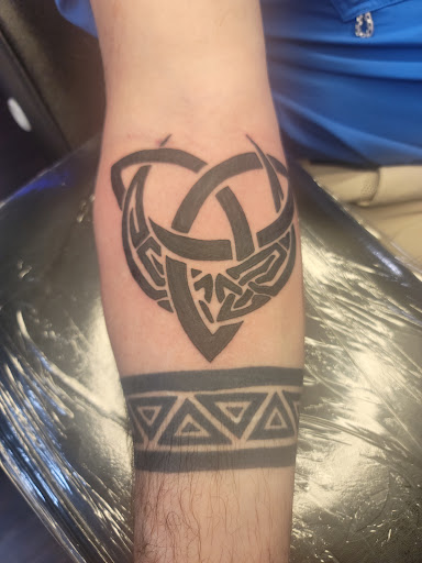 Explore hawaiian tattoos ideas, creative tattoo ideas in Chattanooga, available at The Sailors Den Tattoos and Piercing & The Scurvy Pearl Music Venue