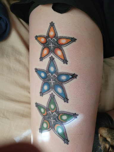 Explore music tattoo ideas for females, creative tattoo ideas in Omaha, available at Black Squirrel Omaha