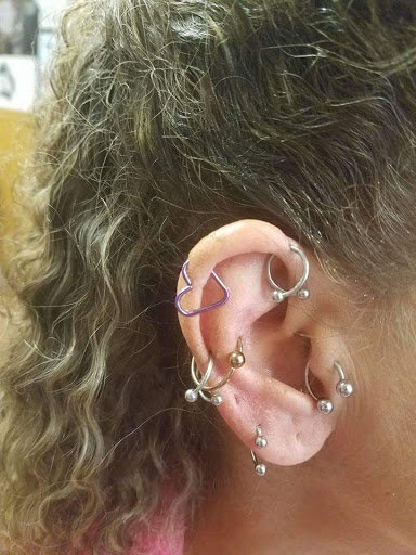 Explore chest piece tattoo ideas for men, creative tattoo ideas in Hudson Falls, available at ALTERED ADDICTION TATTOOS