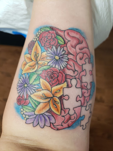 Explore dead dog tattoo ideas, creative tattoo ideas in Belle Chasse, available at The Ravens Nest Tattoo Studio