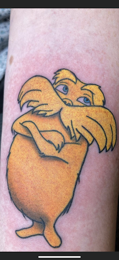 Explore dolphin tattoo ideas for females, creative tattoo ideas in Centralia, available at Cosmic Tattoo