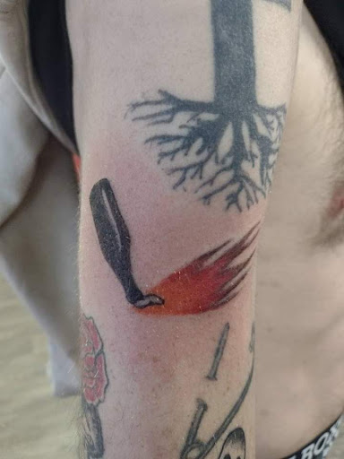 Explore kiss band tattoo ideas, creative tattoo ideas in Cadillac, available at Warchief Tattoo, LLC