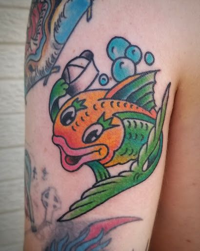 Explore men bicep tattoo ideas, creative tattoo ideas in Libertyville, available at Lucky Seven Tattoo
