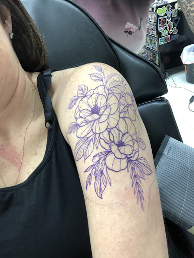 Explore chameleon tattoo ideas, creative tattoo ideas in Fort Wayne, available at InkoFriendly Tattoos