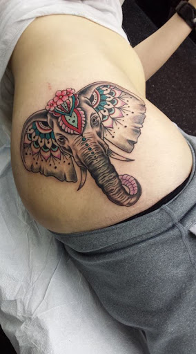 Explore bicep tattoo ideas for guys, creative tattoo ideas in Worcester, available at Unholy Grail Tattoo Inc