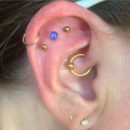 Explore tattoo ideas for athletes, creative tattoo ideas in Summerville, available at Exotic Impressions Body Piercing