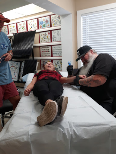 Explore wrist name tattoo ideas, creative tattoo ideas in Clearwater Beach, available at Psychotic Ink