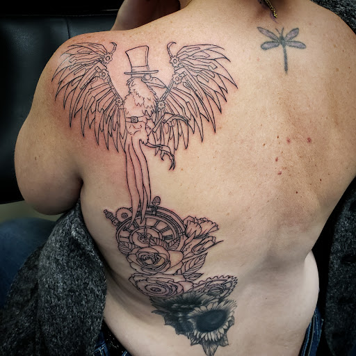 Explore rip tattoo ideas, creative tattoo ideas in Traverse City, available at Pinups & Needles